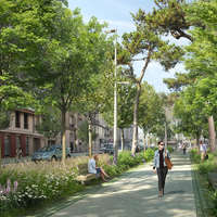 Une rue Gabriel Péri valorisée par une large promenade végétalisée éloignée de la circulation automobile.